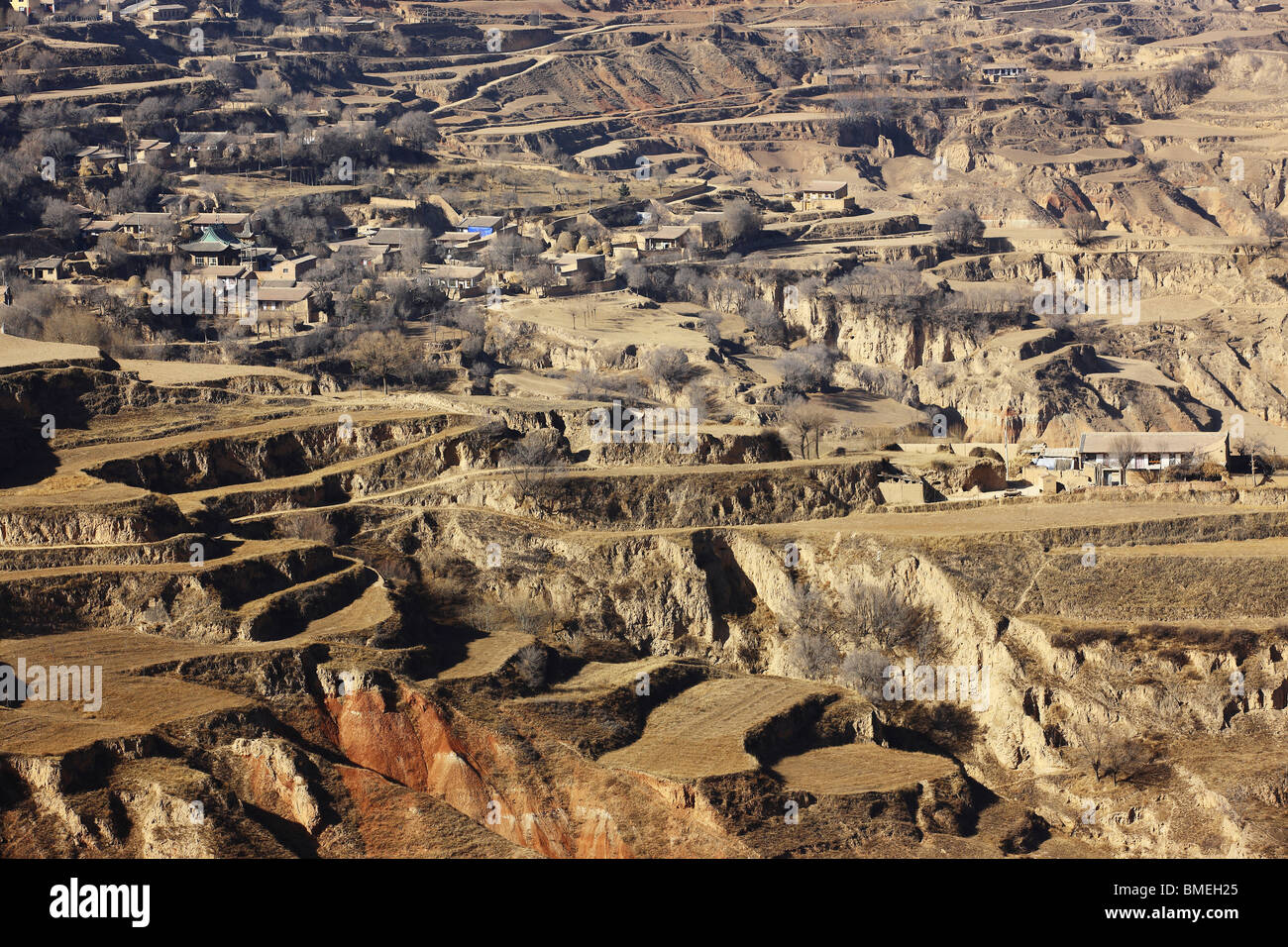 Houses scattering at loess plateau, Guanghe County, Linxia Hui Autonomous Prefecture, Gansu Province, China Stock Photo