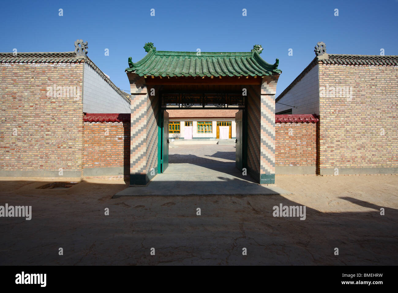 Entrance of the local traditional courtyard, Mageda Village, Tongxin