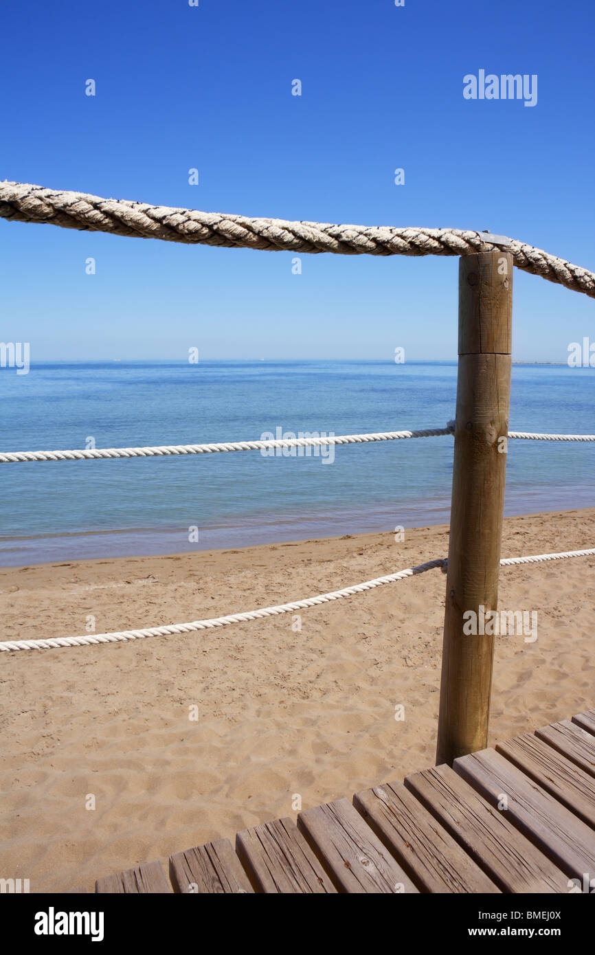 catwalk on wood rope railing on sea beach blue summer horizon Stock ...