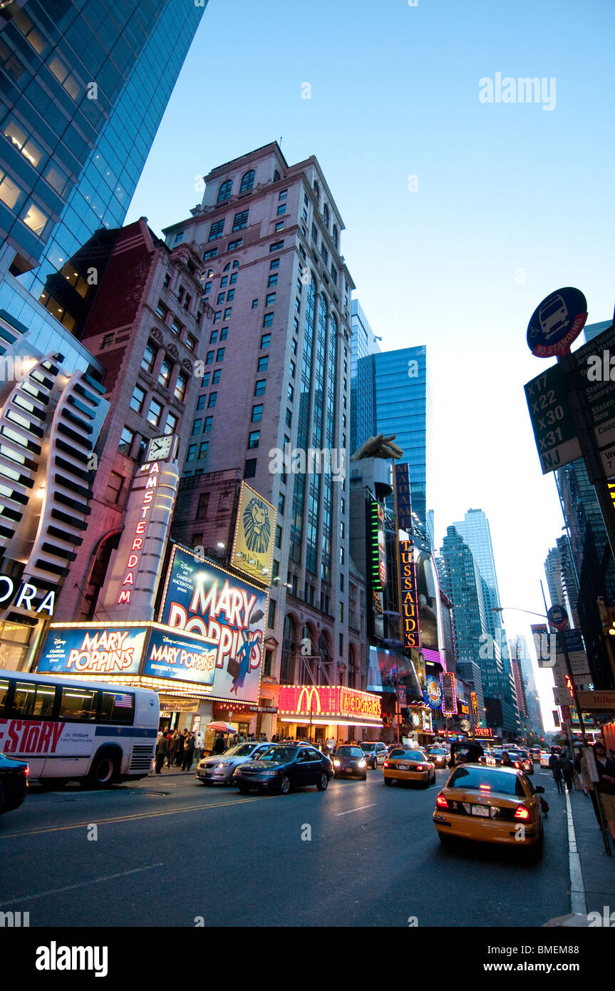 Times Square Congested Bustling Times Square illuminated by advertising billboards and ...