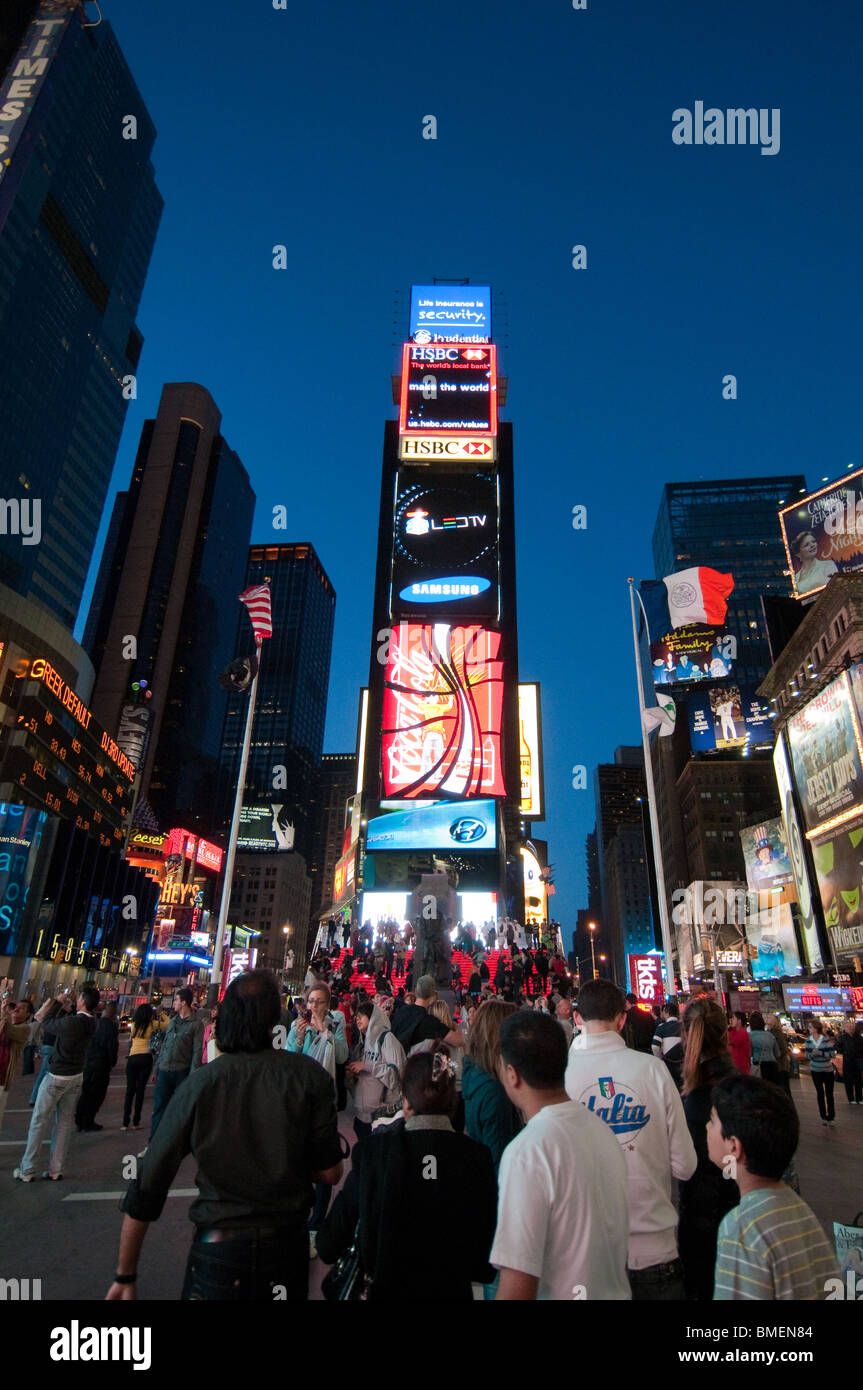 Times Square Congested Bustling Times Square illuminated by corporate billboards and congested ...