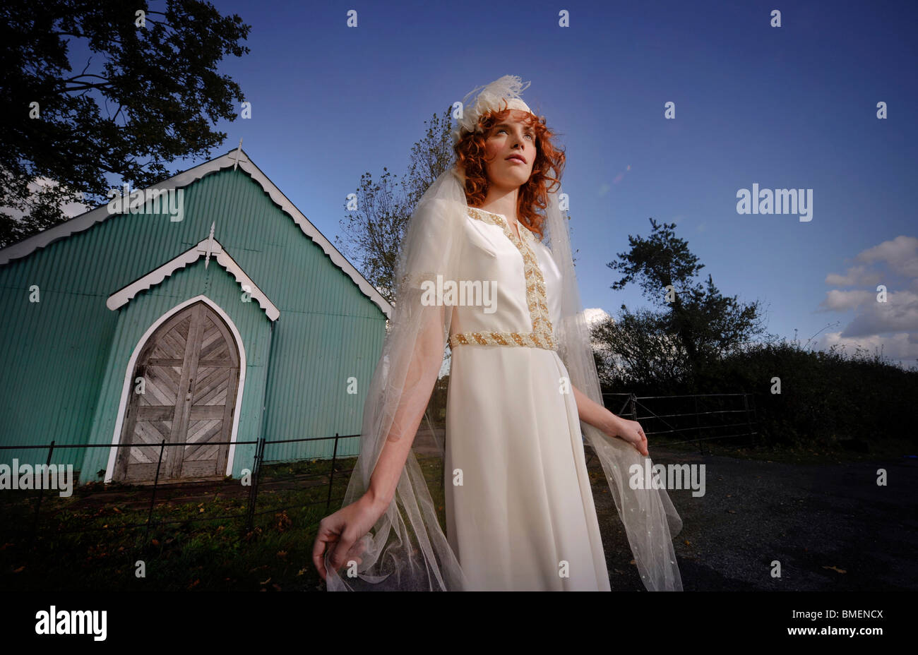 A model poses in a wedding dress created by designer Lisa Redman. Stock Photo