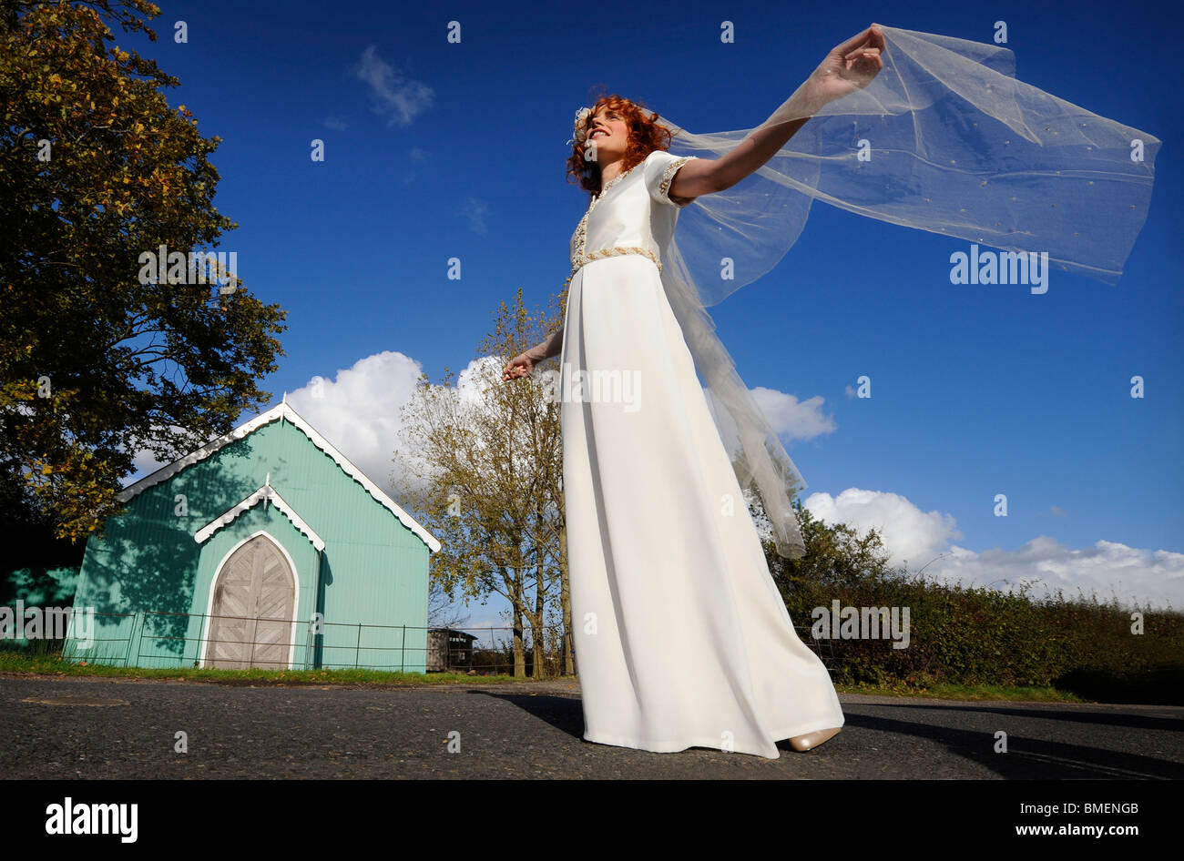 A model poses in a wedding dress created by designer Lisa Redman. Stock Photo