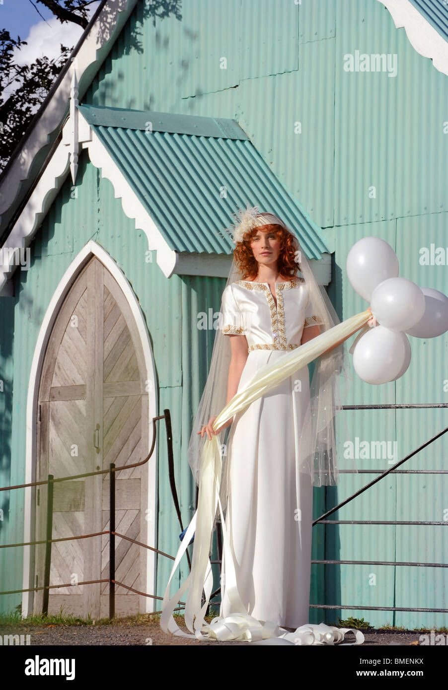 A model poses in a wedding dress created by designer Lisa Redman. Stock Photo