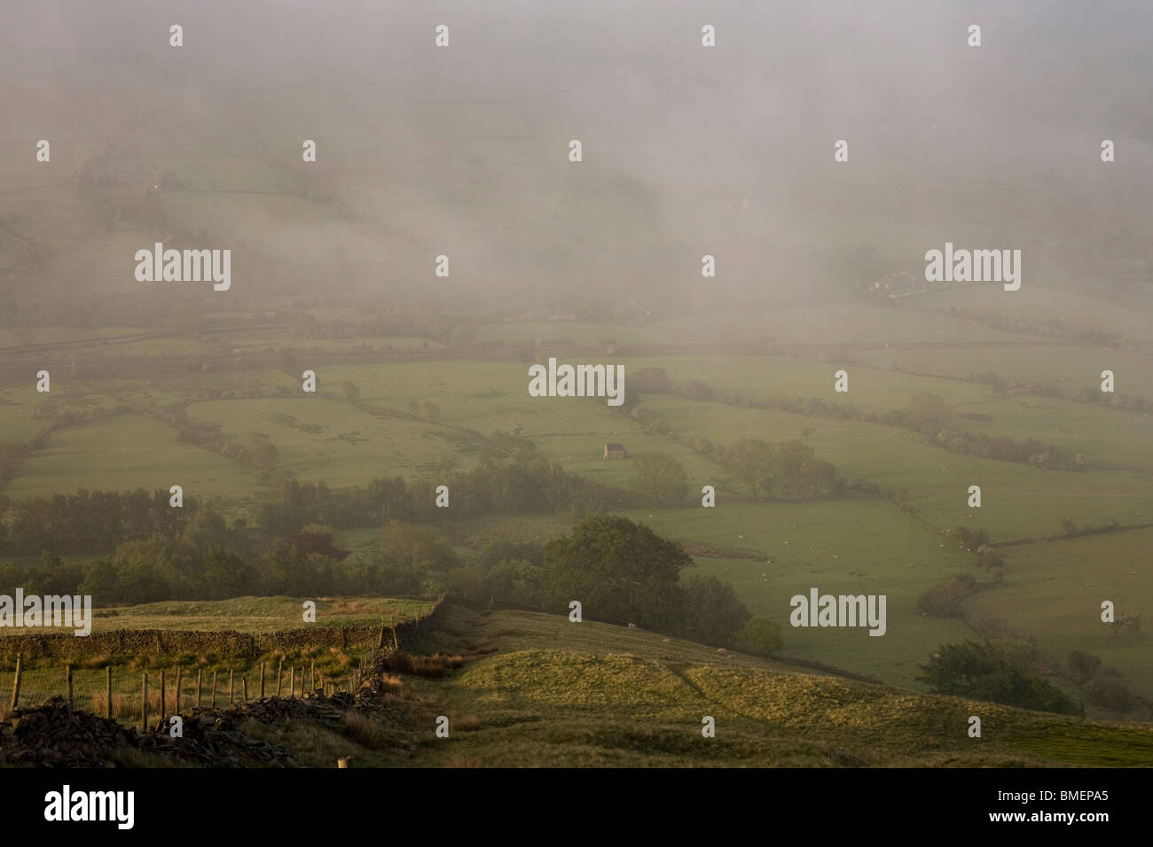 Misty morning overlooking Vale of Edale, Peak District National Park, Derbyshire. Stock Photo