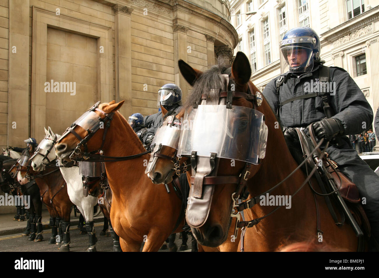 police horses ready outside bank Stock Photo