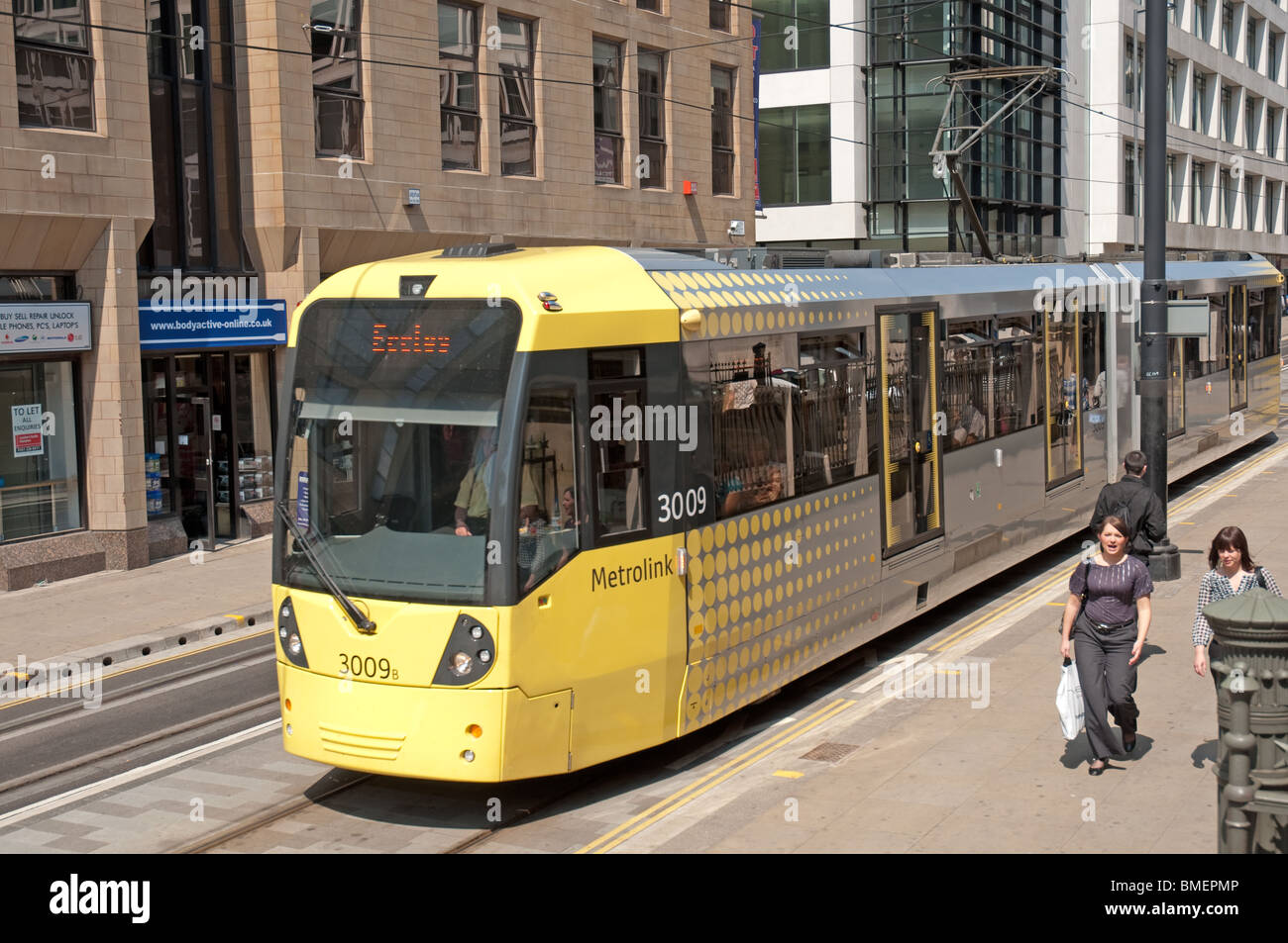 Metrolink tram traveling along Mosley Street in Manchester city centre. Stock Photo