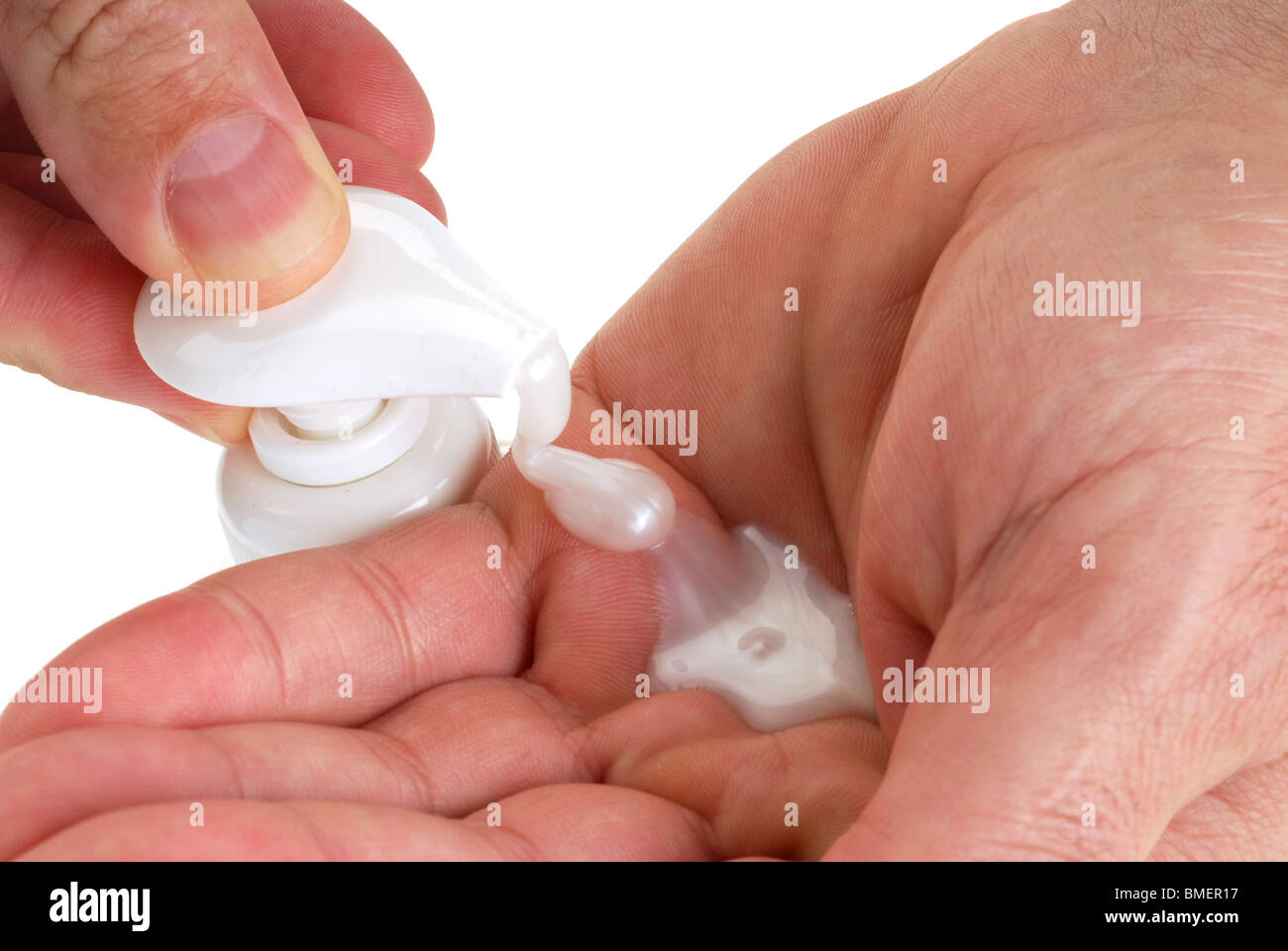 Person is washing hands with antibacterial soap Stock Photo