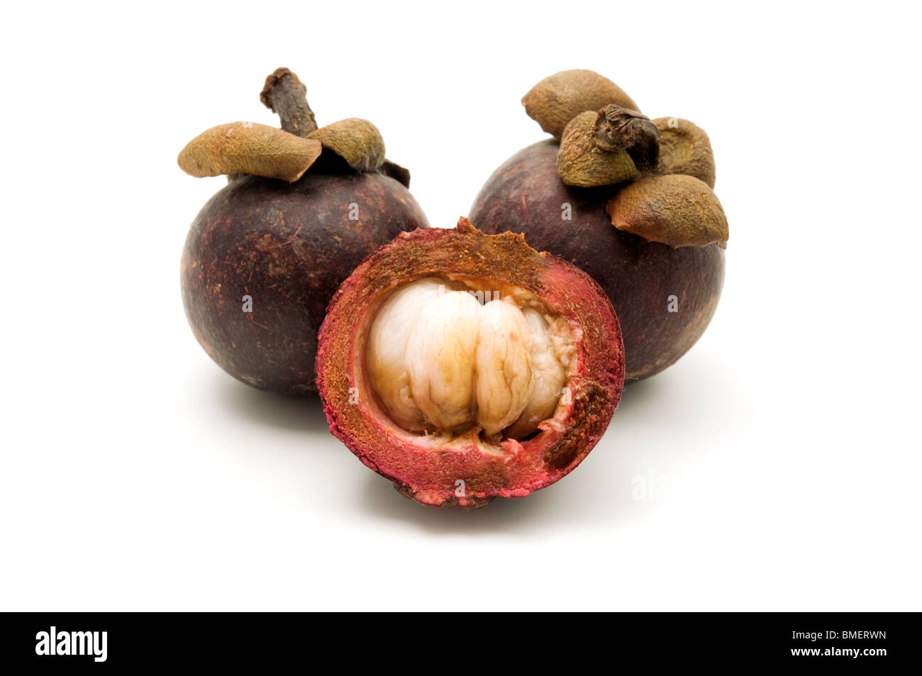 Purple Mangosteens on a white background Stock Photo