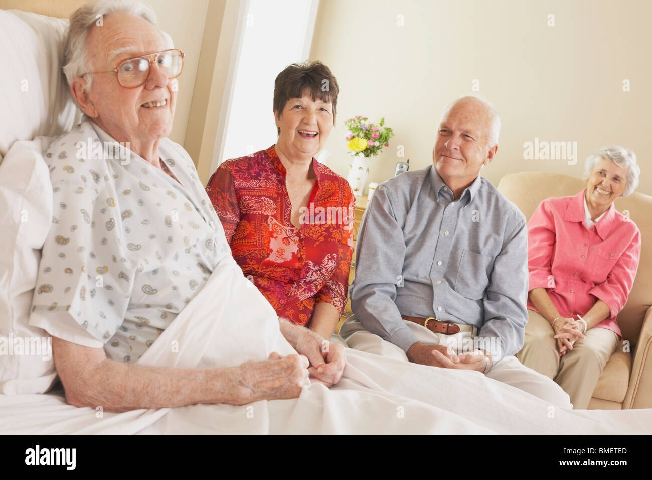 Visiting An Elderly Father In The Hospital Stock Photo Alamy