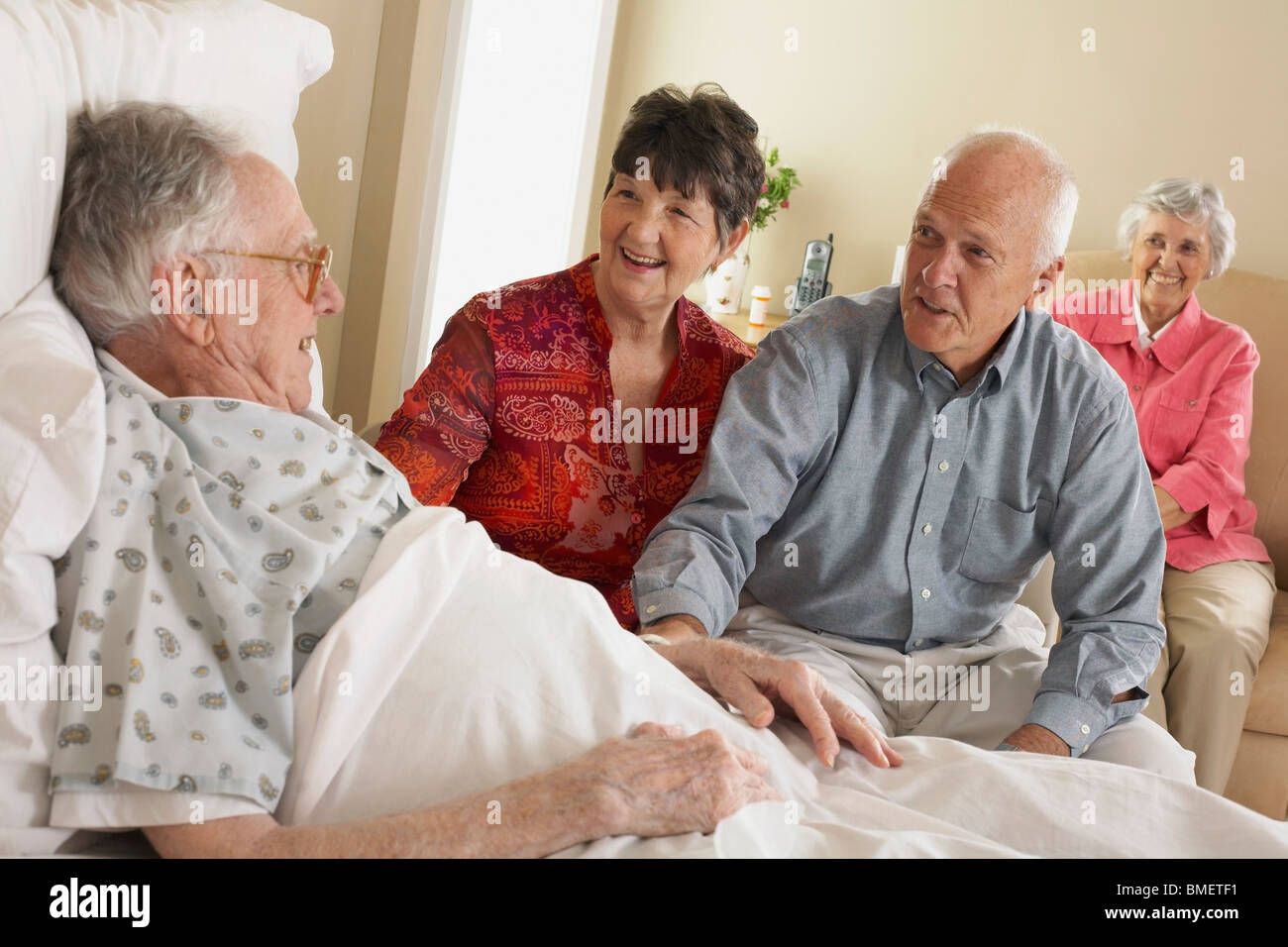 Visiting An Elderly Father In The Hospital Stock Photo Alamy