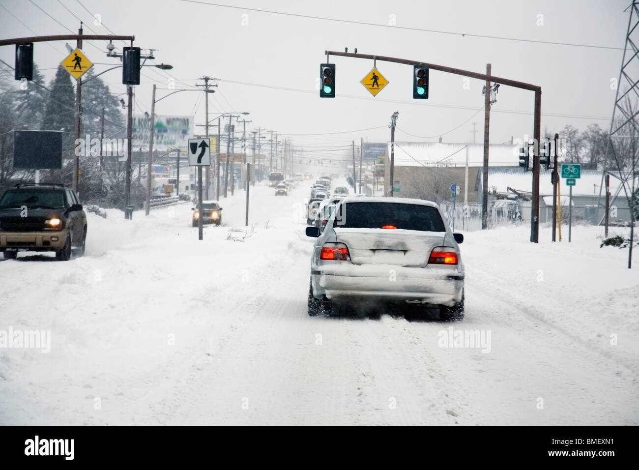 Portland, Oregon, United States Of America; Cars Driving On The Road During A Winter Storm Stock Photo