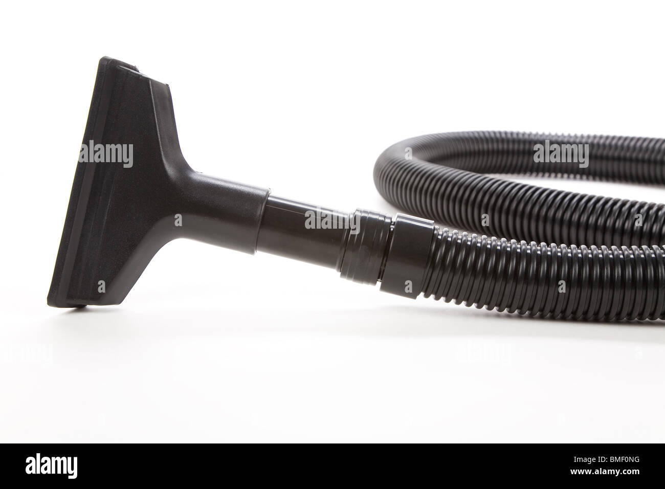 Vacuum Cleaner with Corrugated Tube Stock Photo