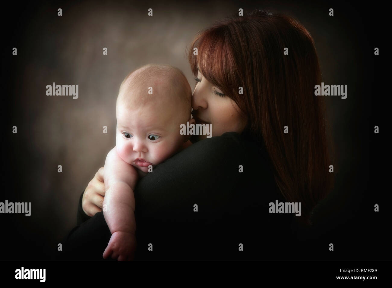A Mother And Her Infant Son Stock Photo