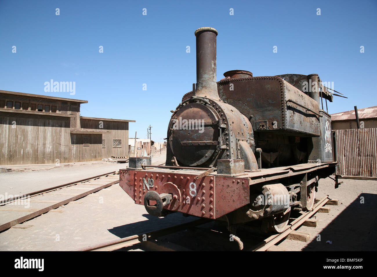 An old disused mining train deteriorating at Humberstone near Iquique, Chile Stock Photo