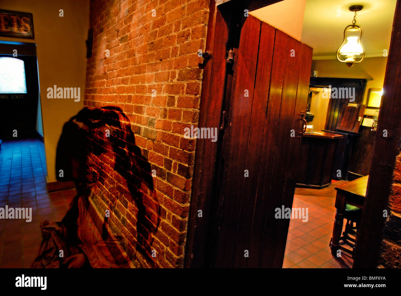 The ghost of a small Victorian child is said to haunt the corridor at the Crooked House Pub in Himley Stock Photo