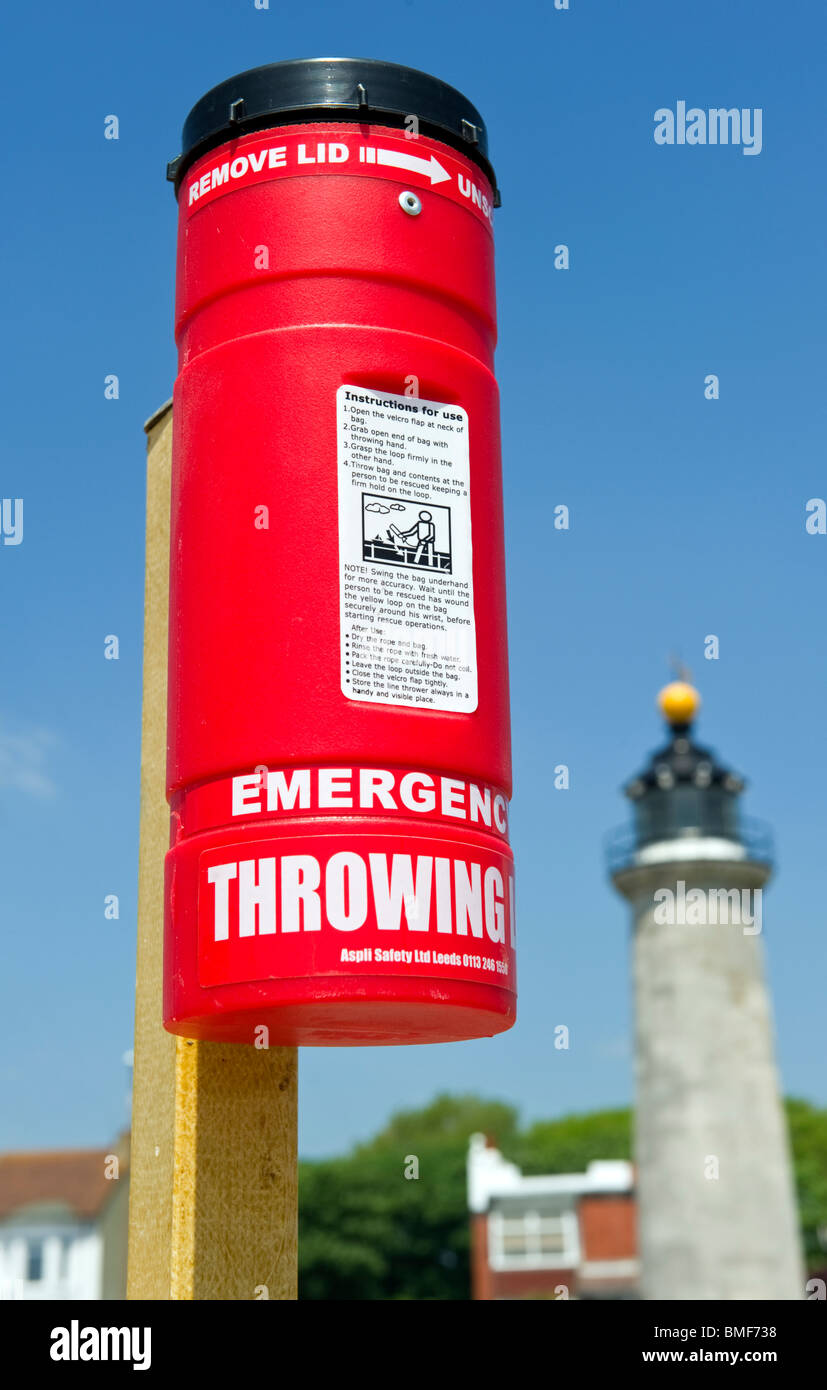 Red emergency throwing line; a life rescue saving device Stock Photo