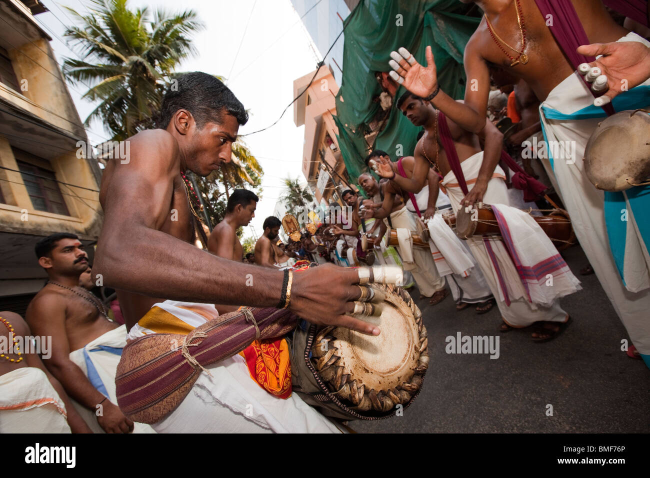 India, Kerala, Kochi, Ernakulam Uthsavom festival, Panchavadyam orchestra playing timila, maddalam, ilathalam and idakka drums Stock Photo