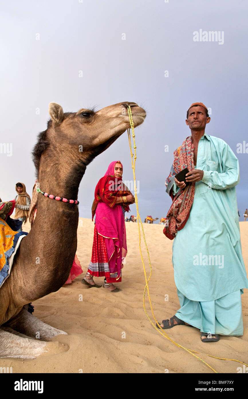 Man with his camel. Sam Sand Dunes National Park. Near Jaisalmer. Rajasthan. India Stock Photo
