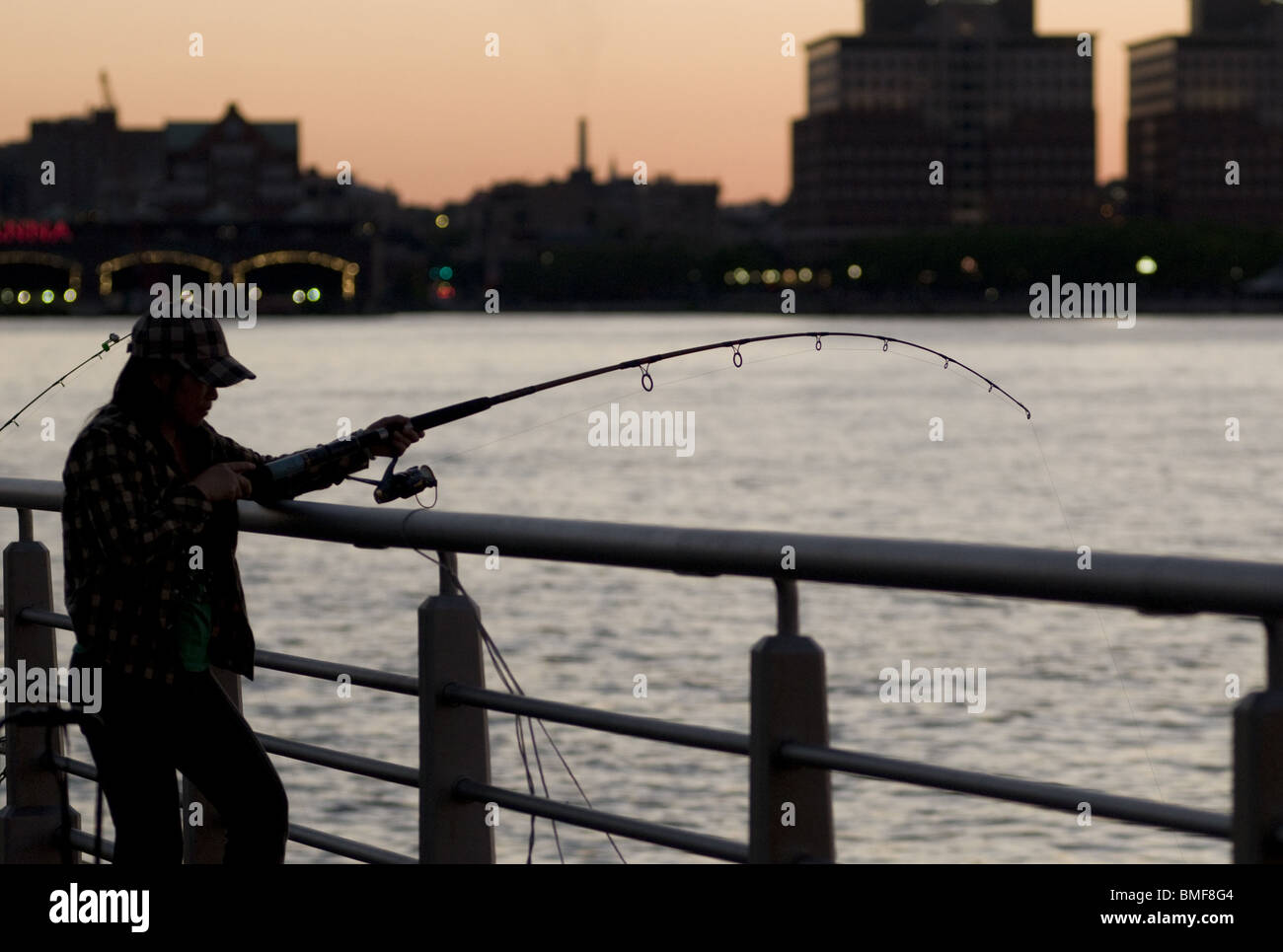 fishing in Hudson river at sunset Stock Photo Alamy