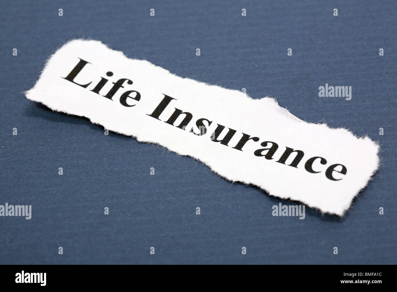 Headline of life Insurance with blue background Stock Photo - Alamy