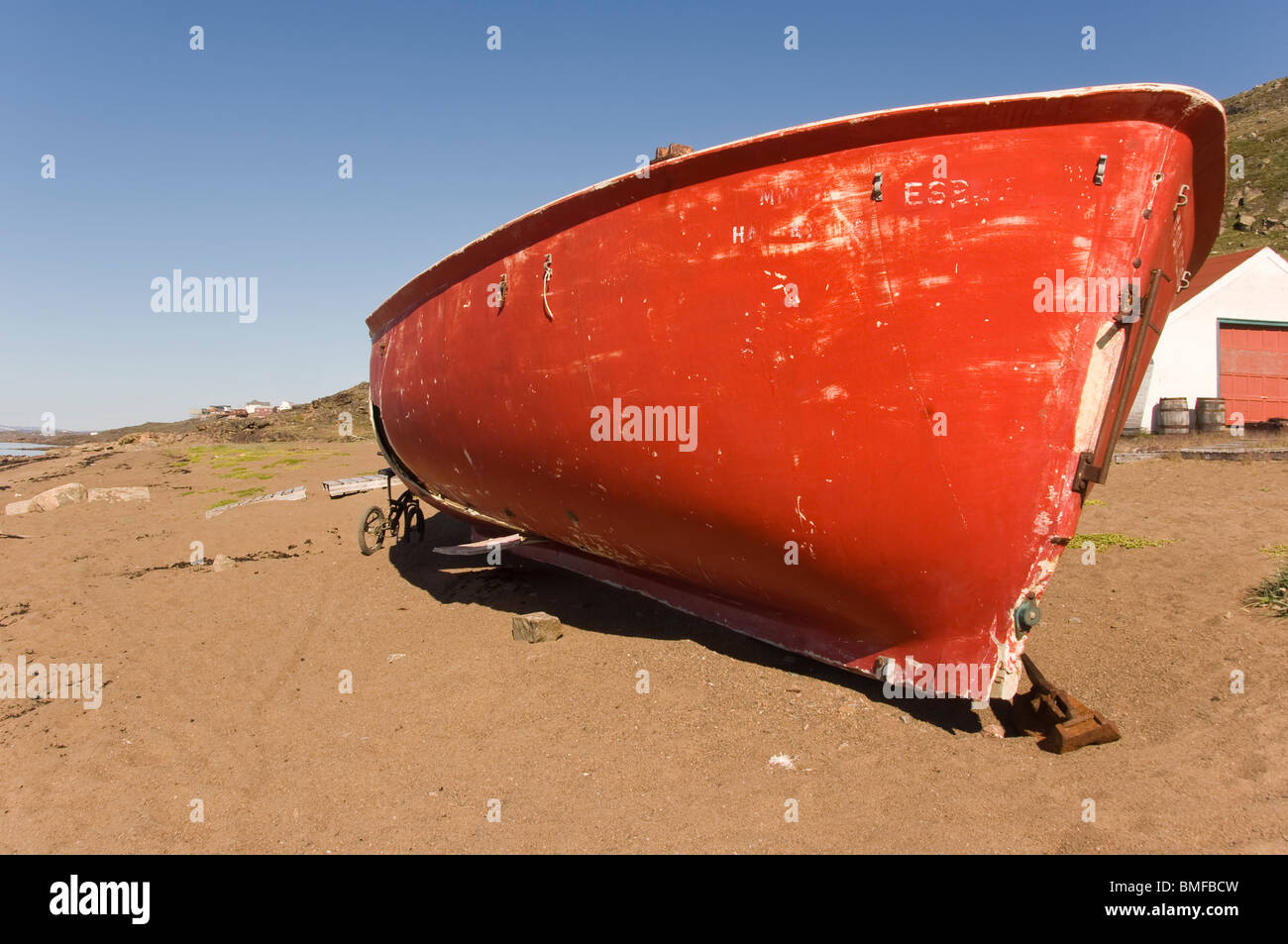 Red Fishing boat, Iqaluit, Frobisher Bay, Baffin Island, Nunavut, Canada Stock Photo