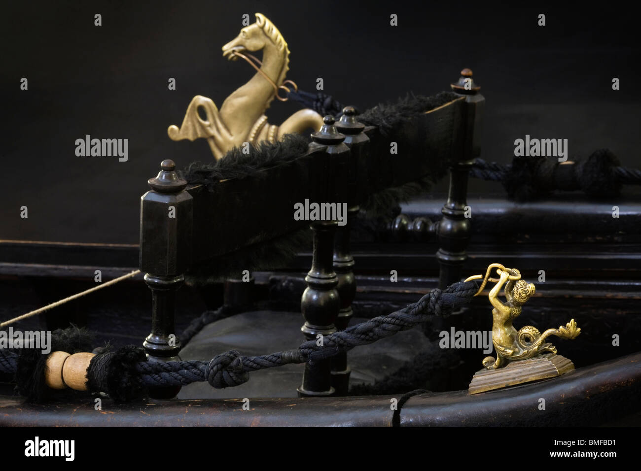 Detail of a Venetian funerary gondola with a golden seahorse Stock Photo
