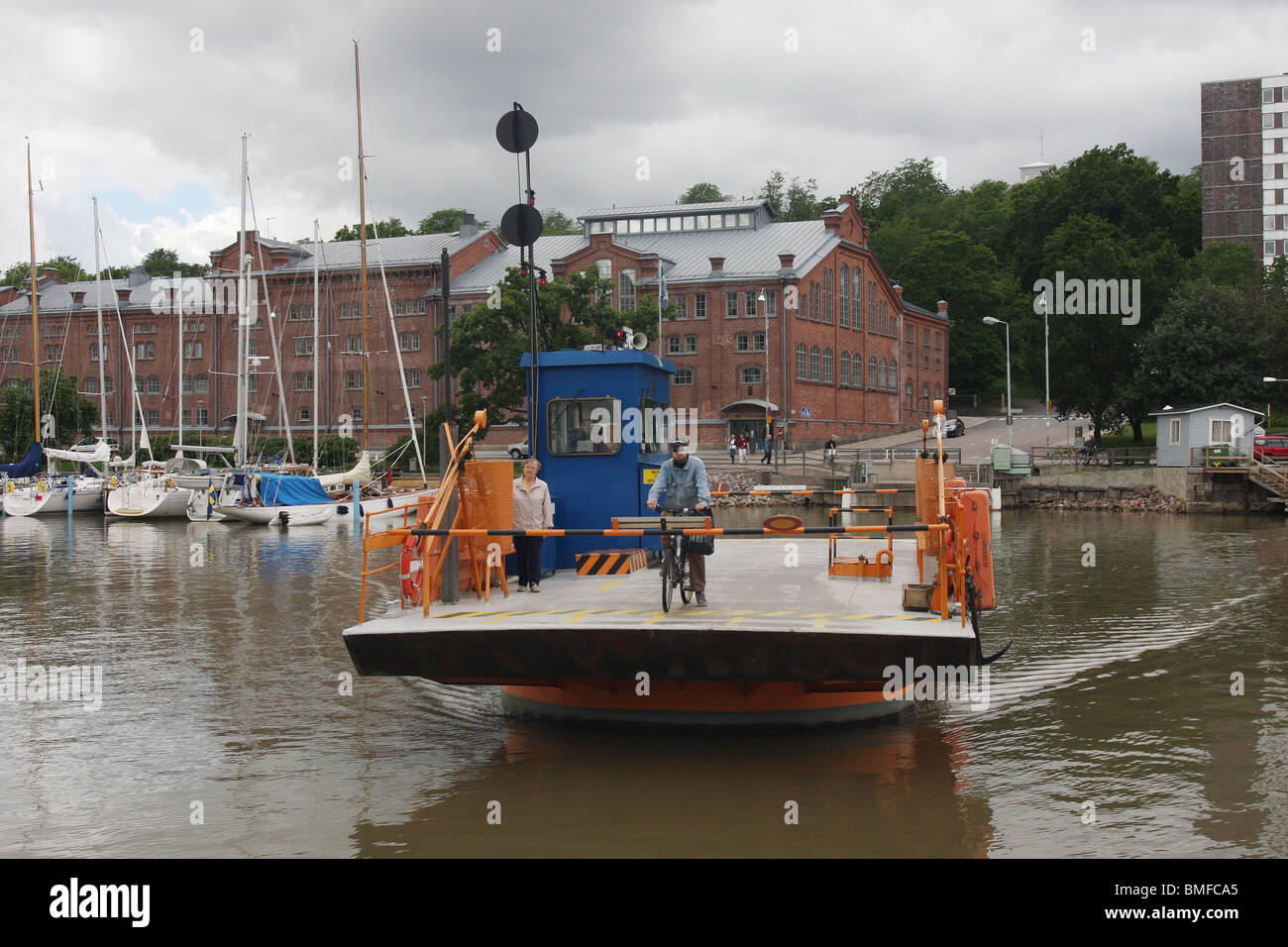 Ferry crossing the River Aura - the pedestrian and cycle ferry in Turku Finland Stock Photo