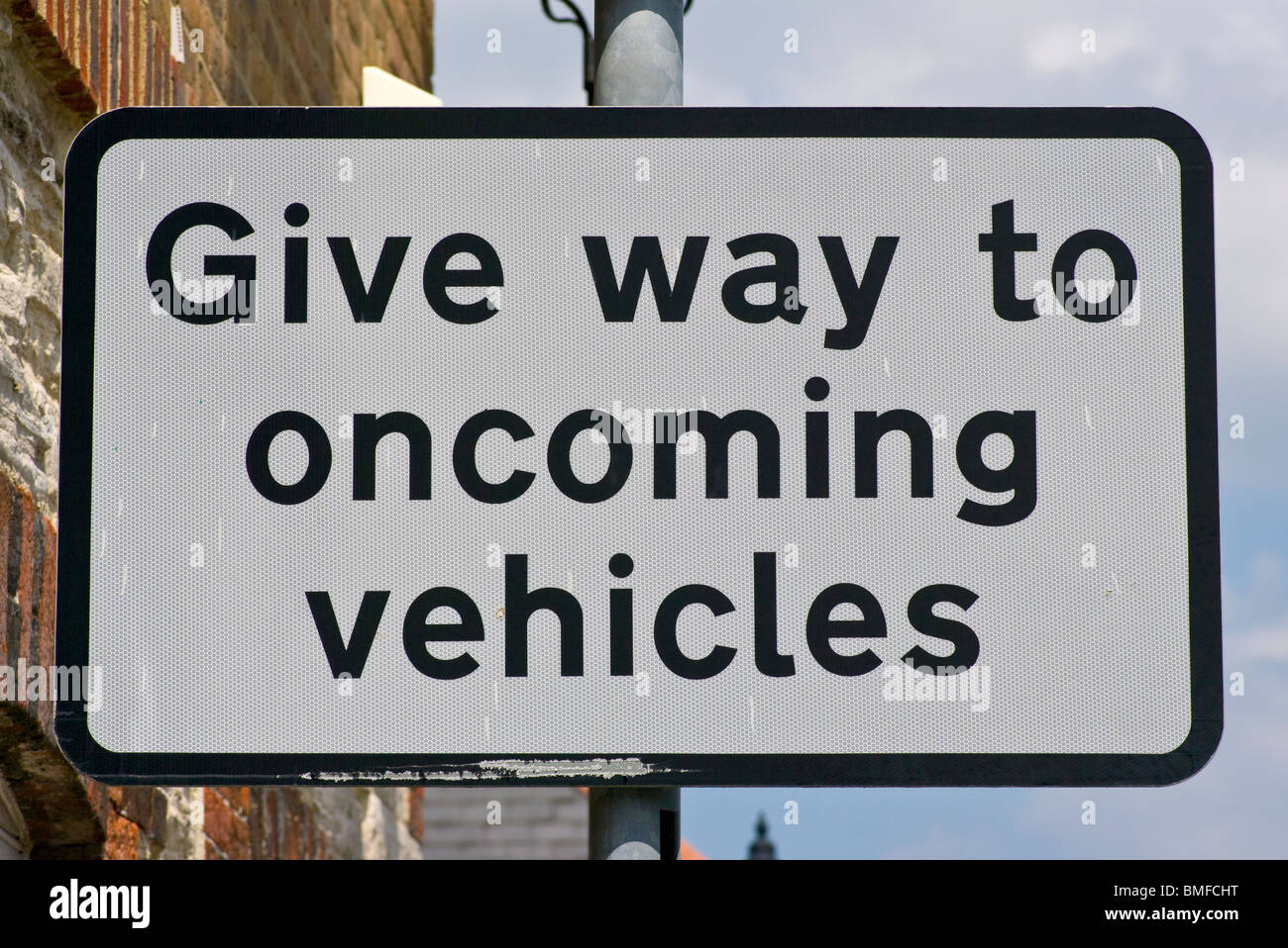 Give Way To Oncoming Vehicles Road Sign Signs  rectangular Stock Photo