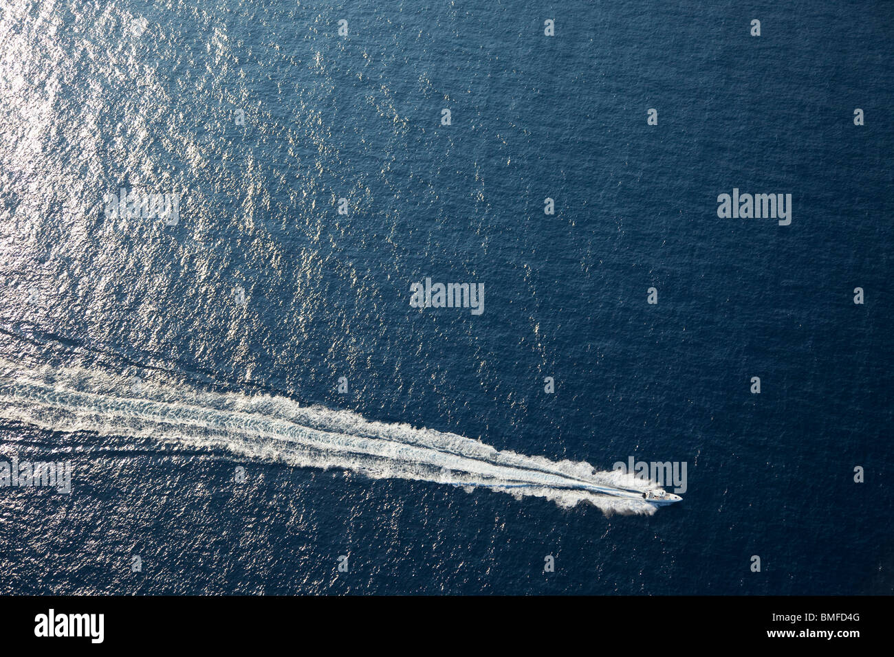 Aerial view of speedboat motorboat in sea north of Majorca in early morning summer Majorca Mallorca Spain Europe Stock Photo