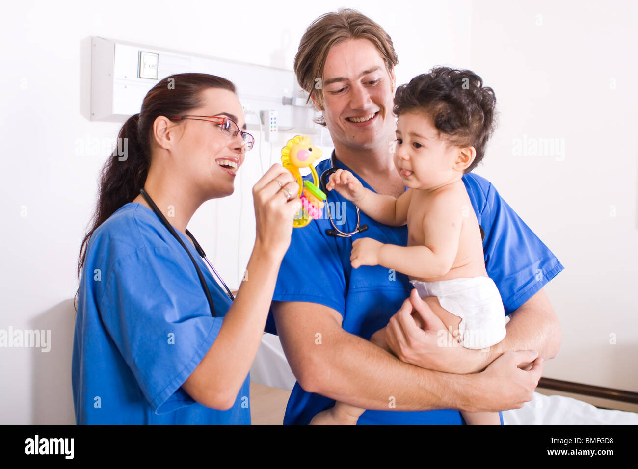 baby boy in hospital ward with doctor and nurse Stock Photo - Alamy