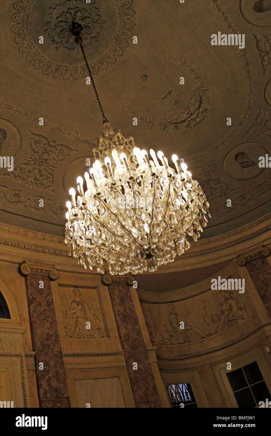 Crystal Chandelier Hanging In A Classically Decorated Room