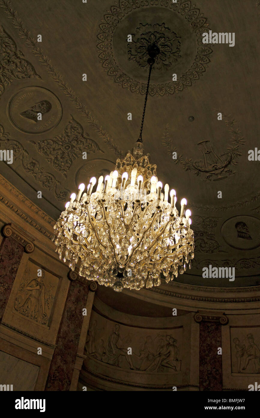 Crystal Chandelier Hanging In A Classically Decorated Room