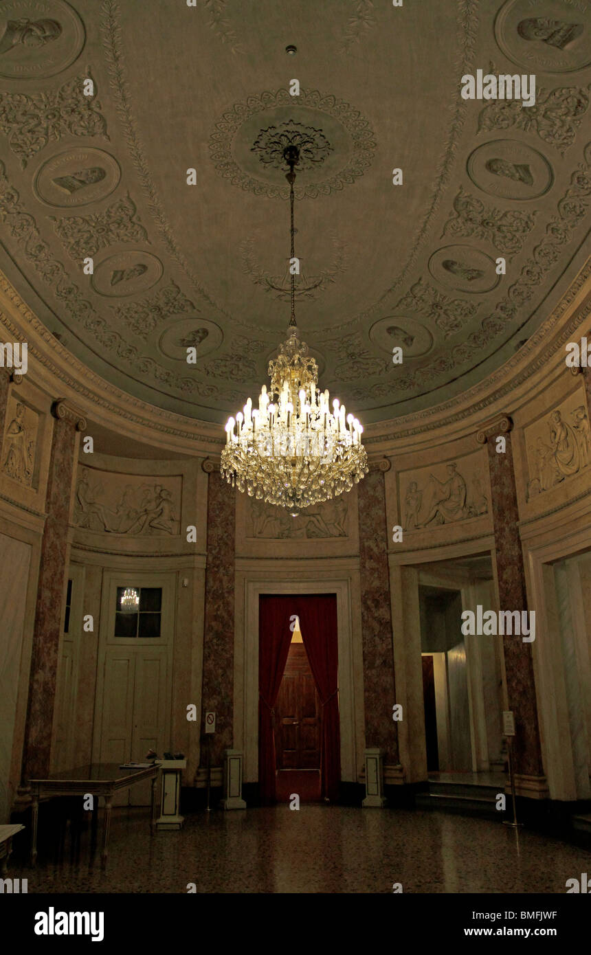 Crystal Chandelier Hanging In A Classically Decorated Room
