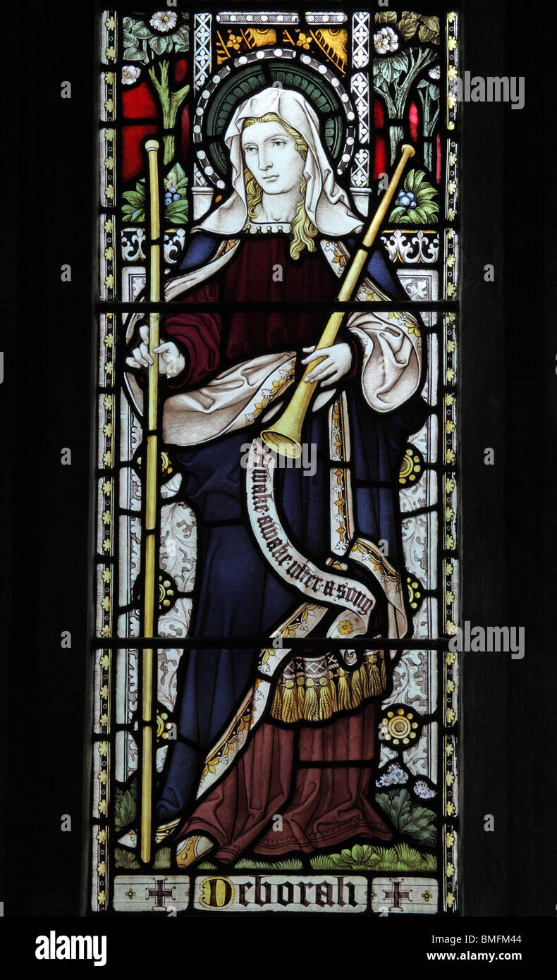 A stained glass window by Clayton & Bell of 1908 depicting Saint Deborah the Prophetess, St Peter and St Paul Church, Wing, Rutland, England Stock Photo