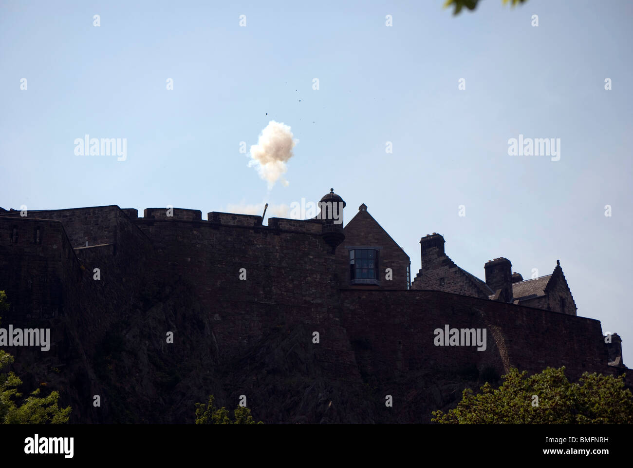 The One O'clock Gun being fired from Edinburgh Castle. Photographed