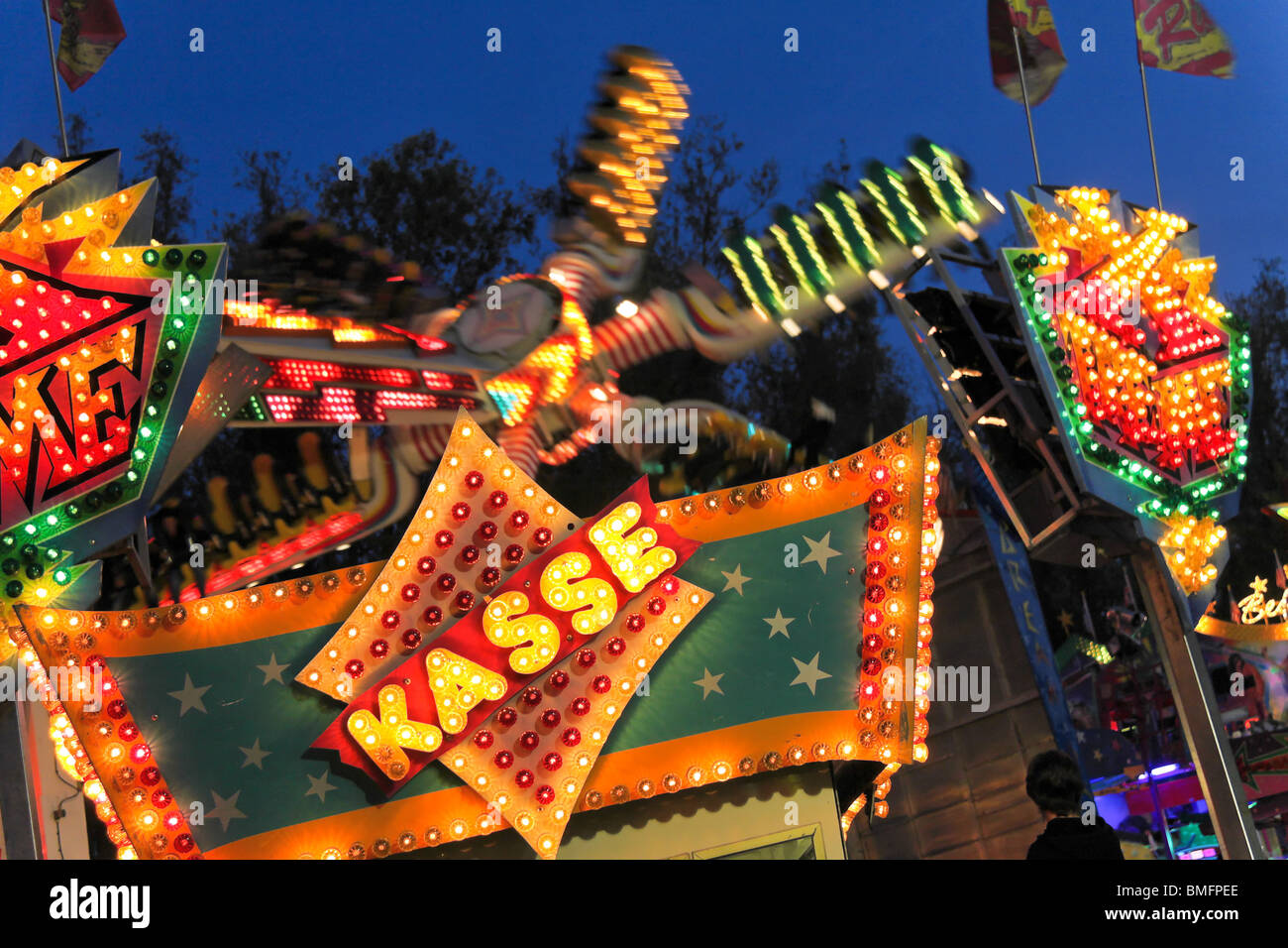 Cashier in an amusement park Stock Photo Alamy