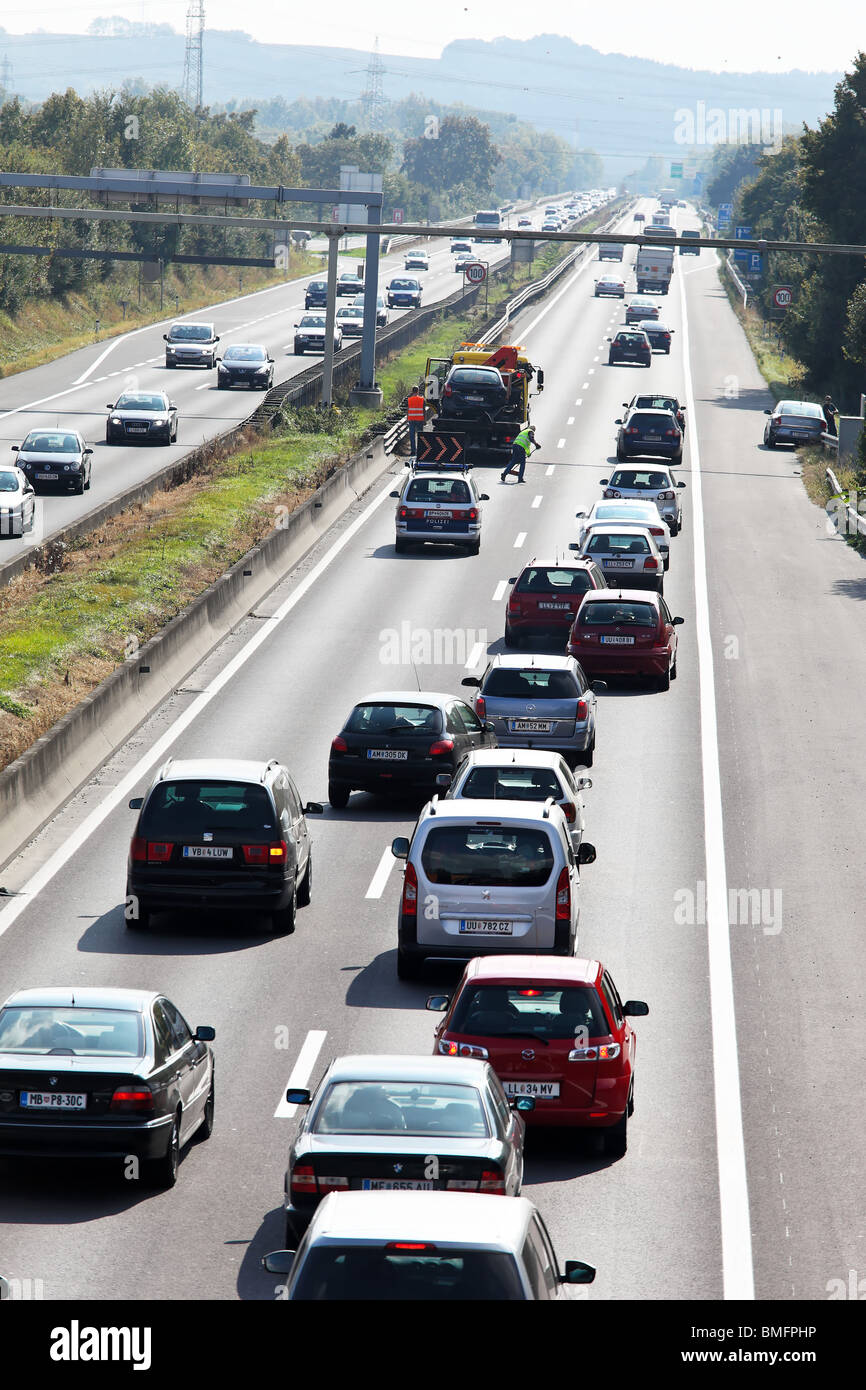Traffic jam in the street with cars on a highway Stock Photo - Alamy