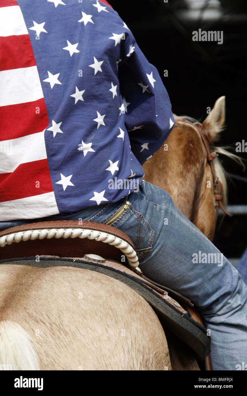 Rider Withe Star cowboy rider riding wearing stars and stripes shirt Stock Photo - Alamy