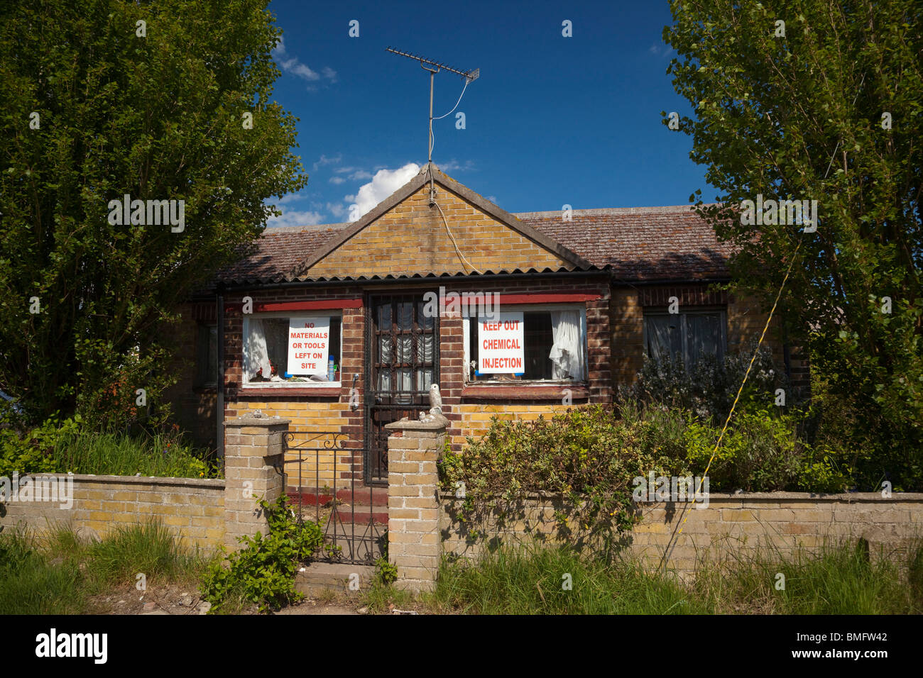A small bungalow in Jaywick, Essex, UK which is being chemically treated Stock Photo