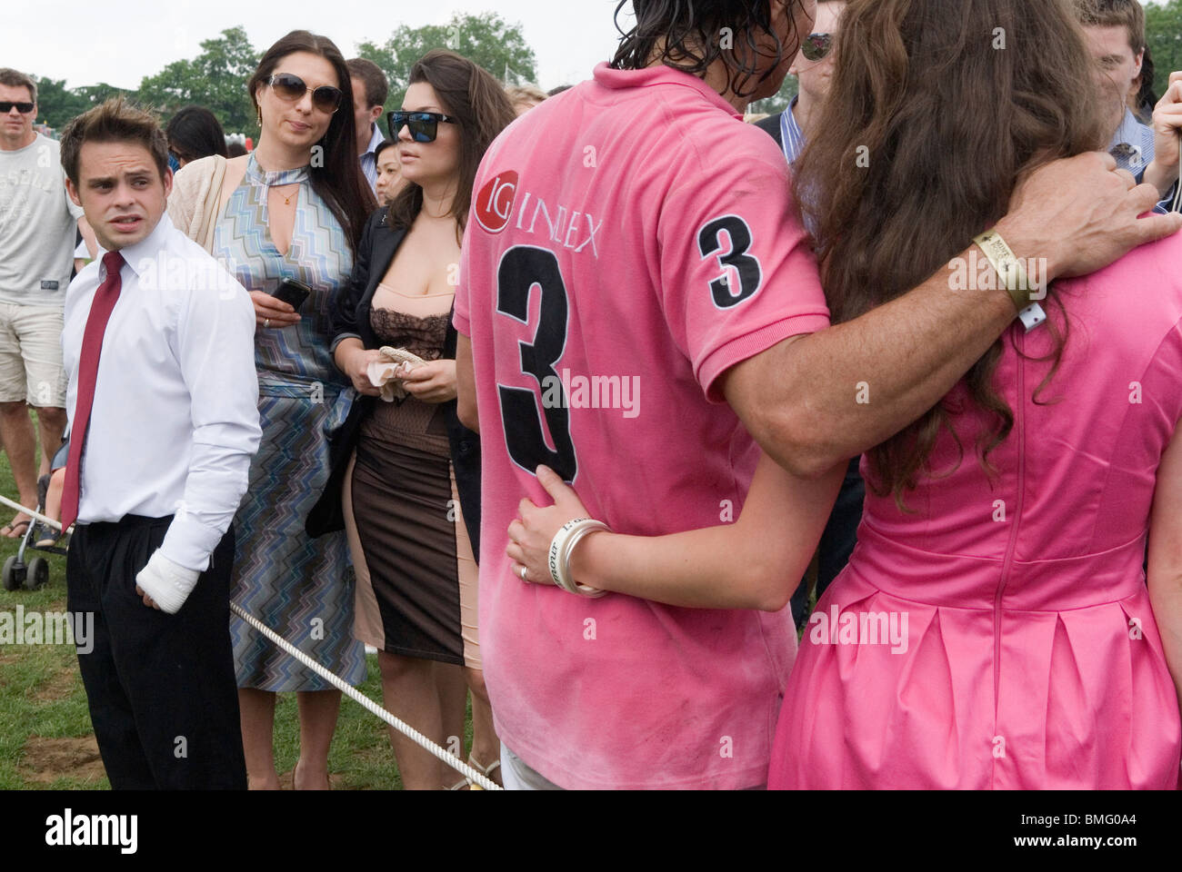 Polo players with girl fan. Polo in the Park. Hurlingham Park Fulham London Uk  Fans meet the players. HOMER SYKES Stock Photo