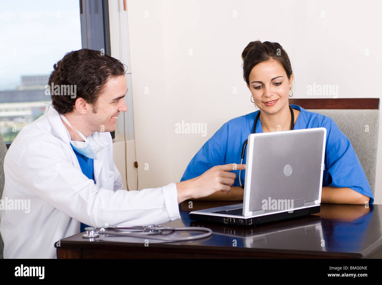 medical discussion between two doctor and nurse Stock Photo - Alamy