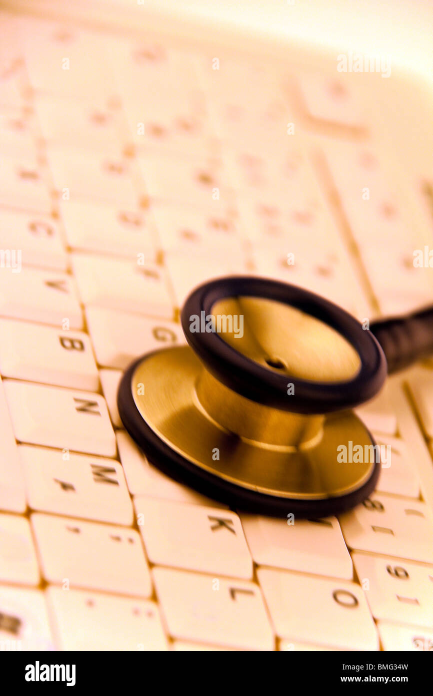 A computer keyboard and stethoscope. IT for physicians. Stock Photo