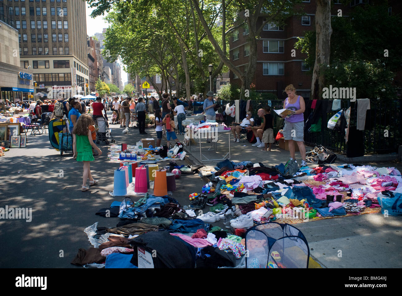 Shoppers search for bargains at a flea market in the New York neighborhood of Chelsea Stock Photo