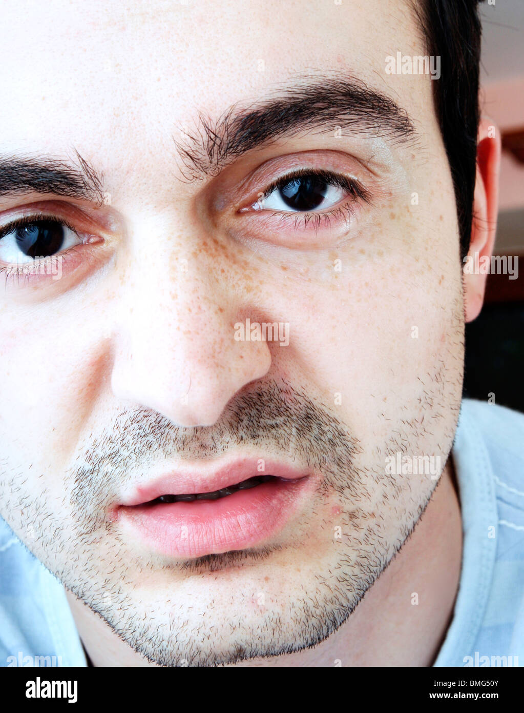 Young man face - close-up Stock Photo