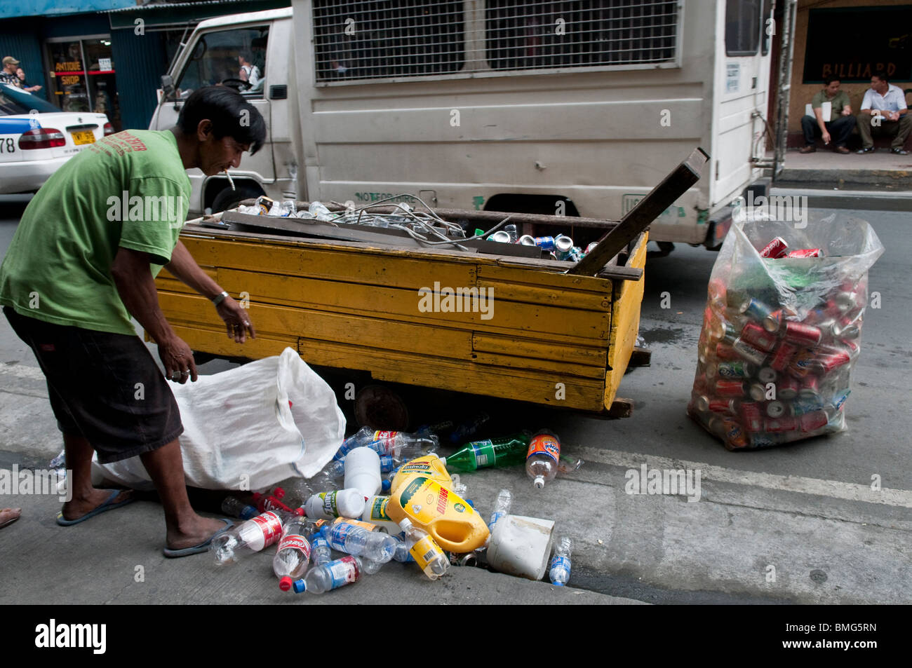 Collecting garbage manila philippines hires stock photography and