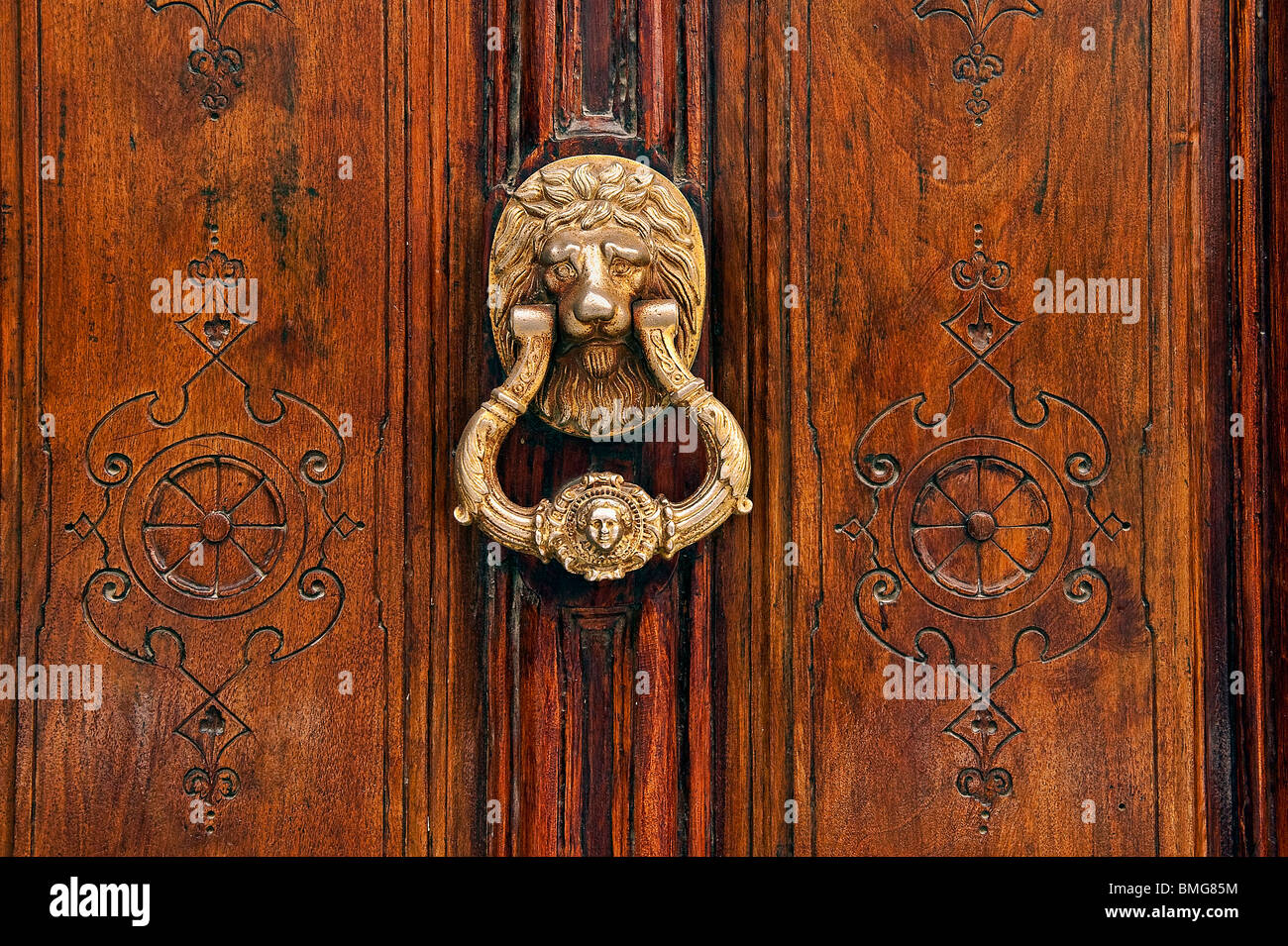 Traditional brass door knocker, Madrid, Spain Stock Photo
