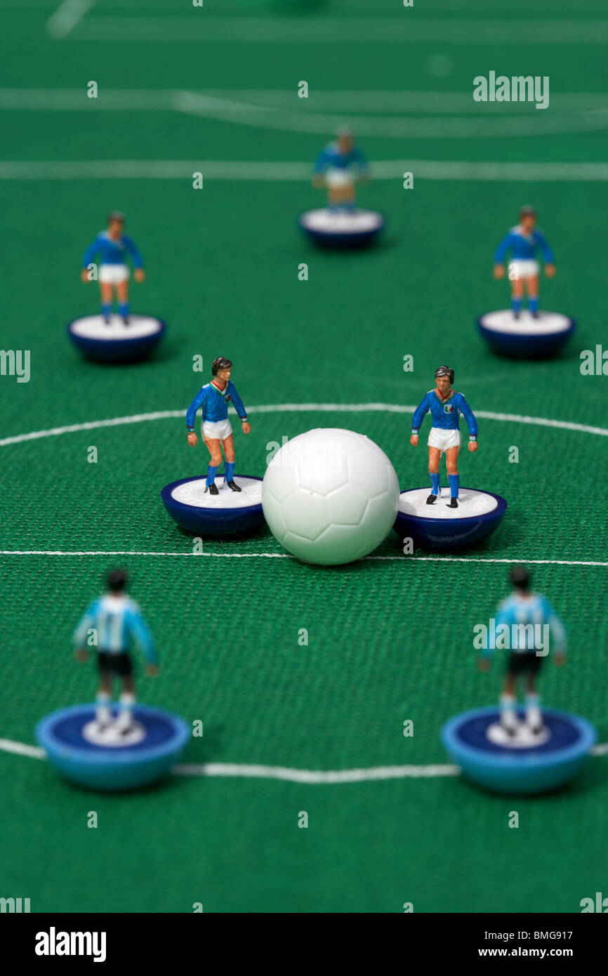 kick off or restart football soccer scene reinacted with subbuteo table