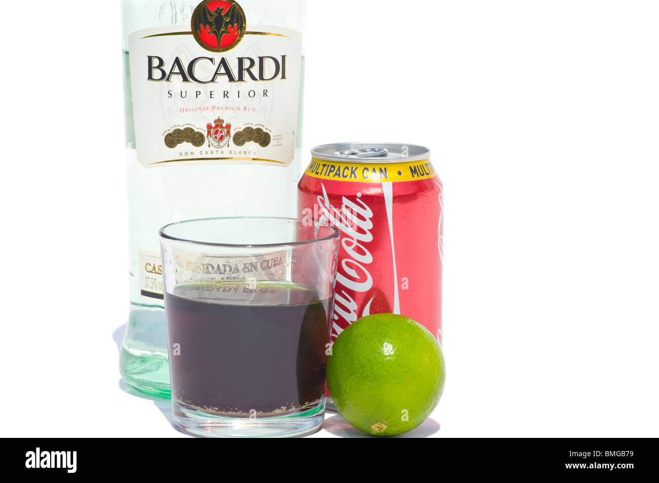 Bottle Of Bacardi White Rum A Glass And Can Of Coca Cola And A Lime Isolated Against A White Background Stock Photo