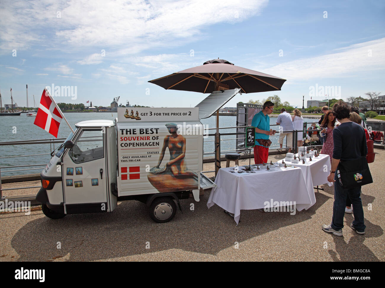 Tri-car souvenir stall at Langelinie in the port of Copenhagen selling miniatures of The Little Mermaid. Stock Photo